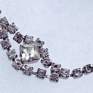 Vintage cut glass shimmering bracelet with ornate decor.
